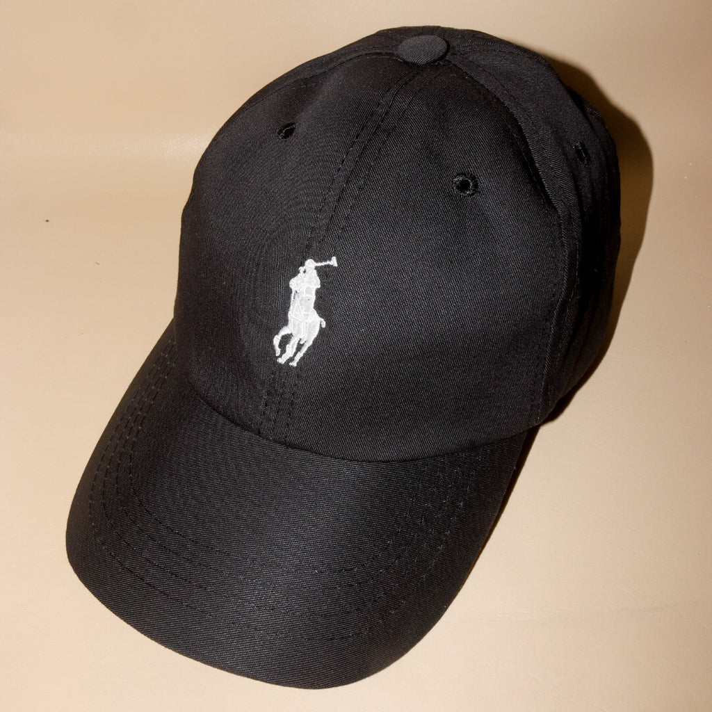 Black polo with white pony