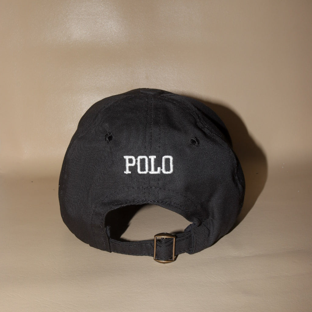 Black polo with white pony